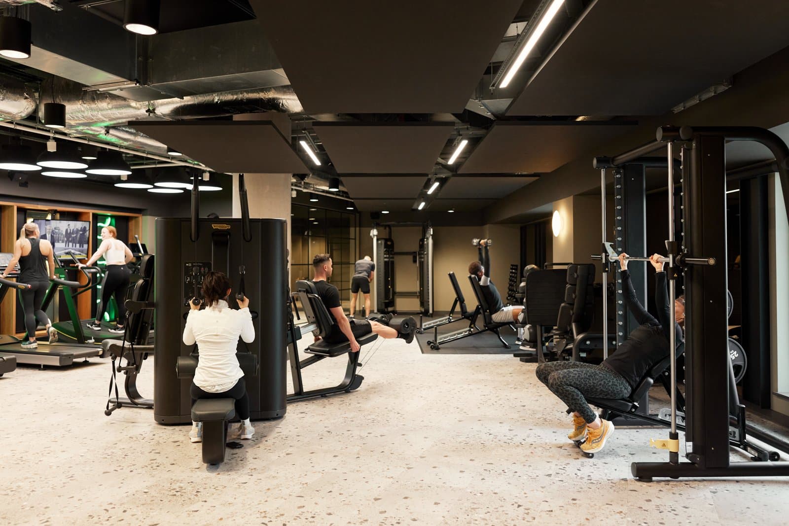 Residents training in an ALT RESIDE resident gym